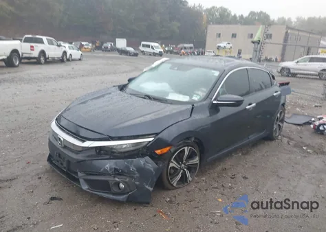 2016 Honda Civic Touring z USA, uszkodzony, nr VIN 19XFC1F93GE209876